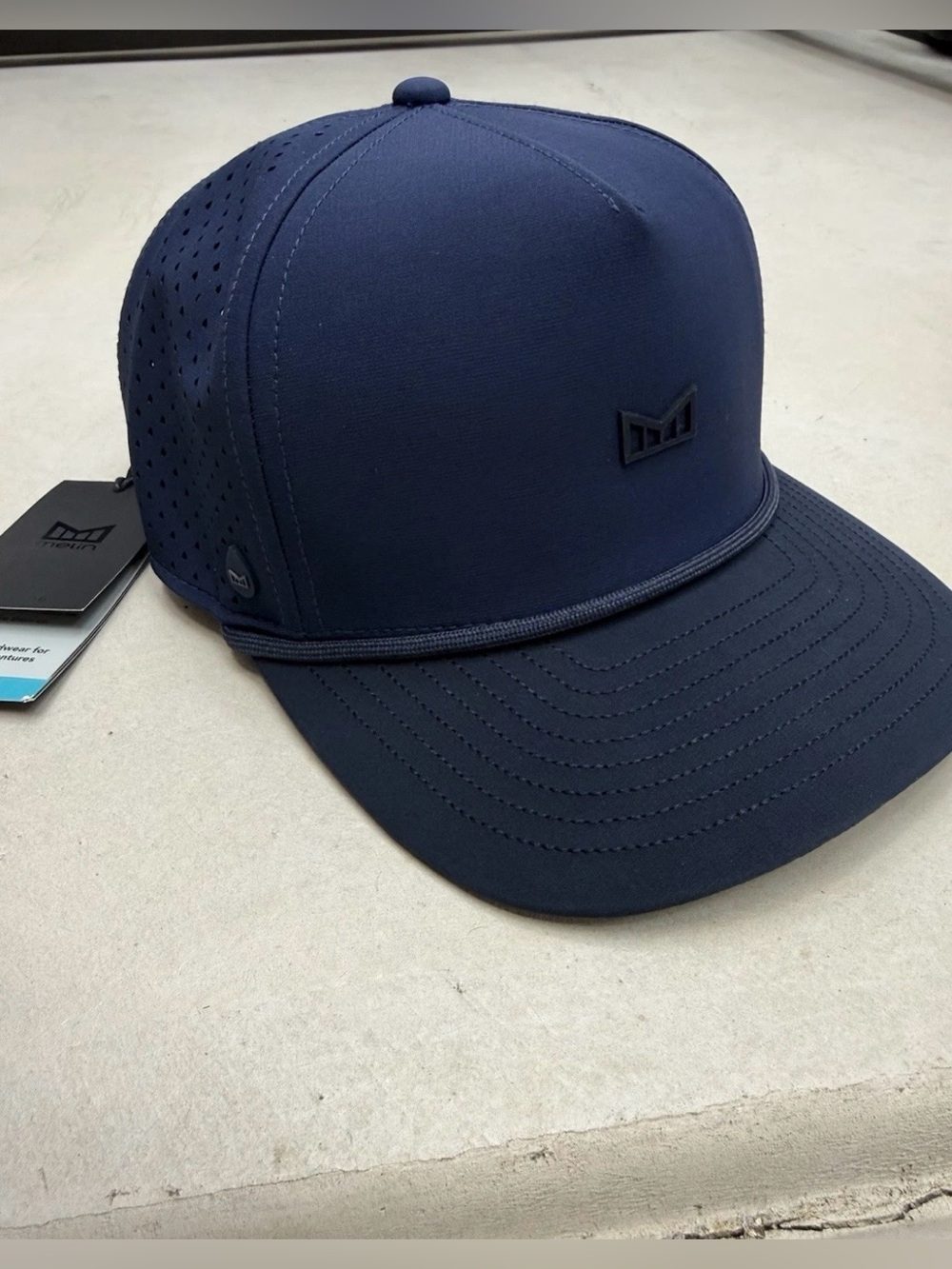 Melin Men’s Navy Performance Snapback Hat